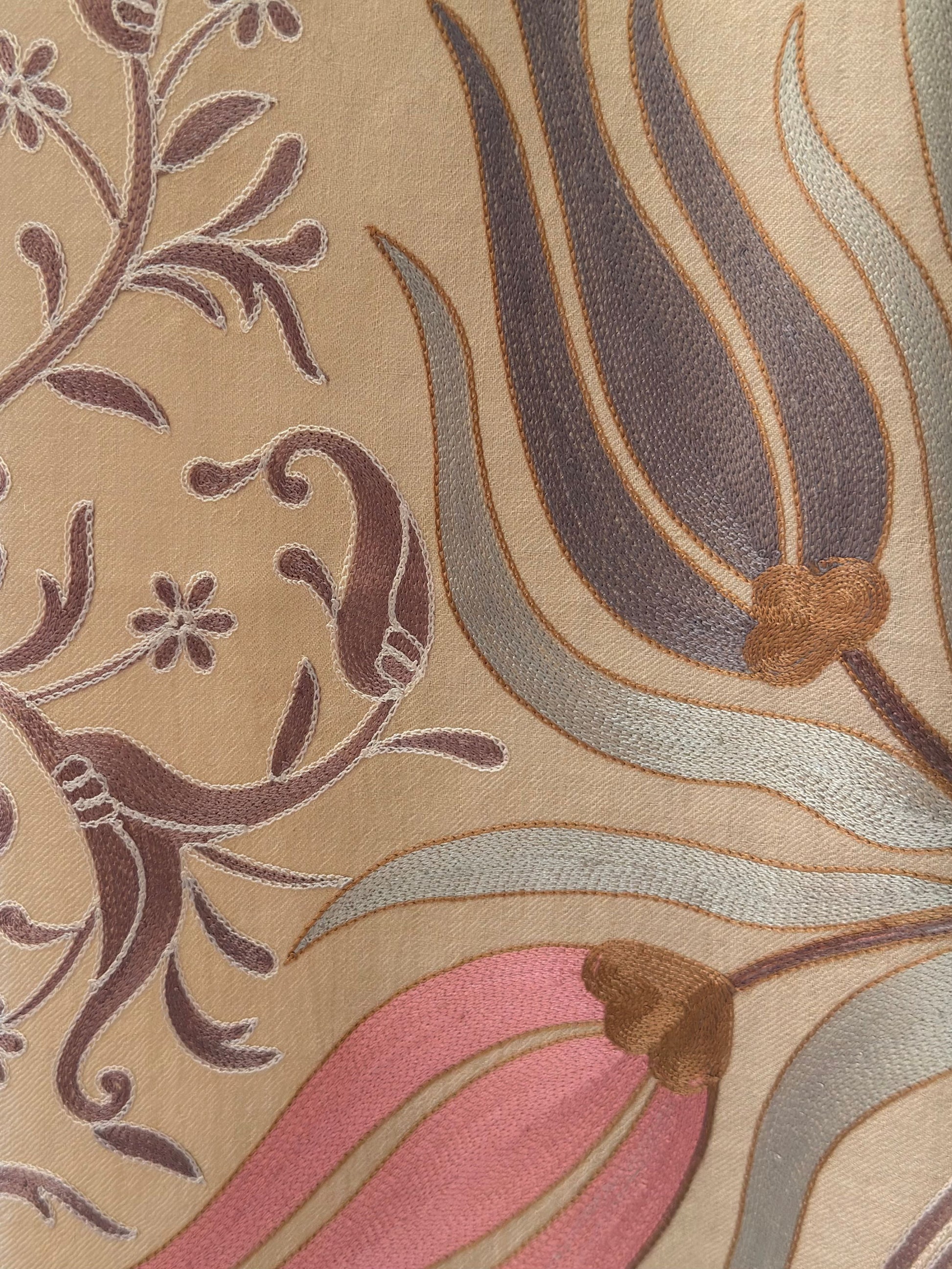 Noori Couture handwoven cream Nalki Jamawar shawl featuring intricate floral silk embroidery in soft pastel tones.