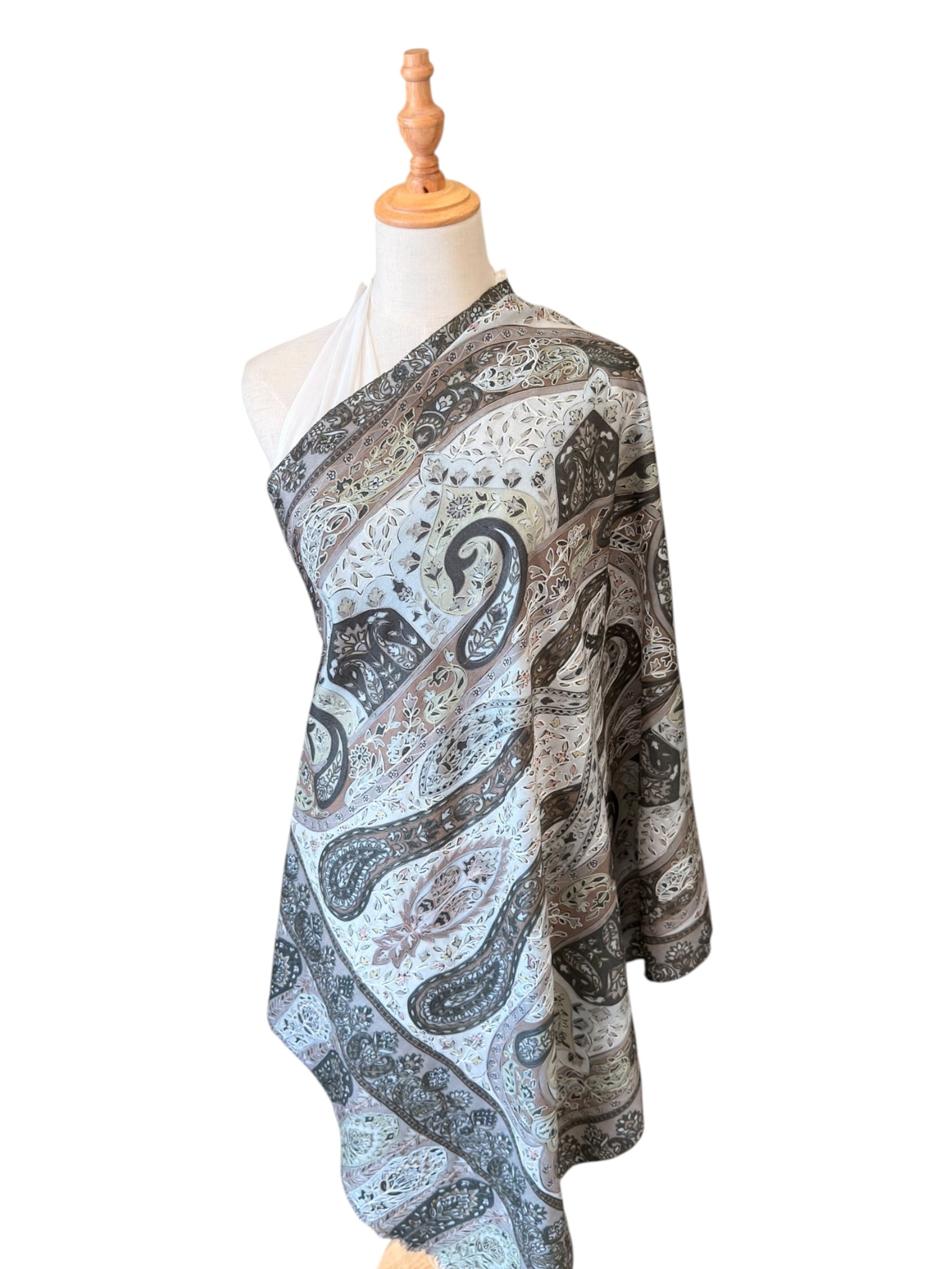 Noori Couture olive handwoven Kalamkari shawl in merino wool and silk with intricate hand-painted paisley patterns.