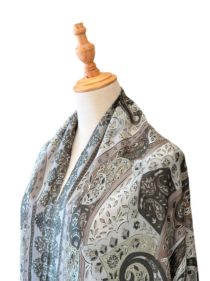 Noori Couture olive handwoven Kalamkari shawl in Merino wool and silk with intricate hand-painted floral patterns.