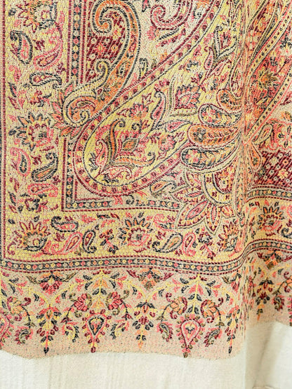 Noori Couture desert brown pashmina shawl featuring an intricate multi-colored paisley pattern and delicate fringe.