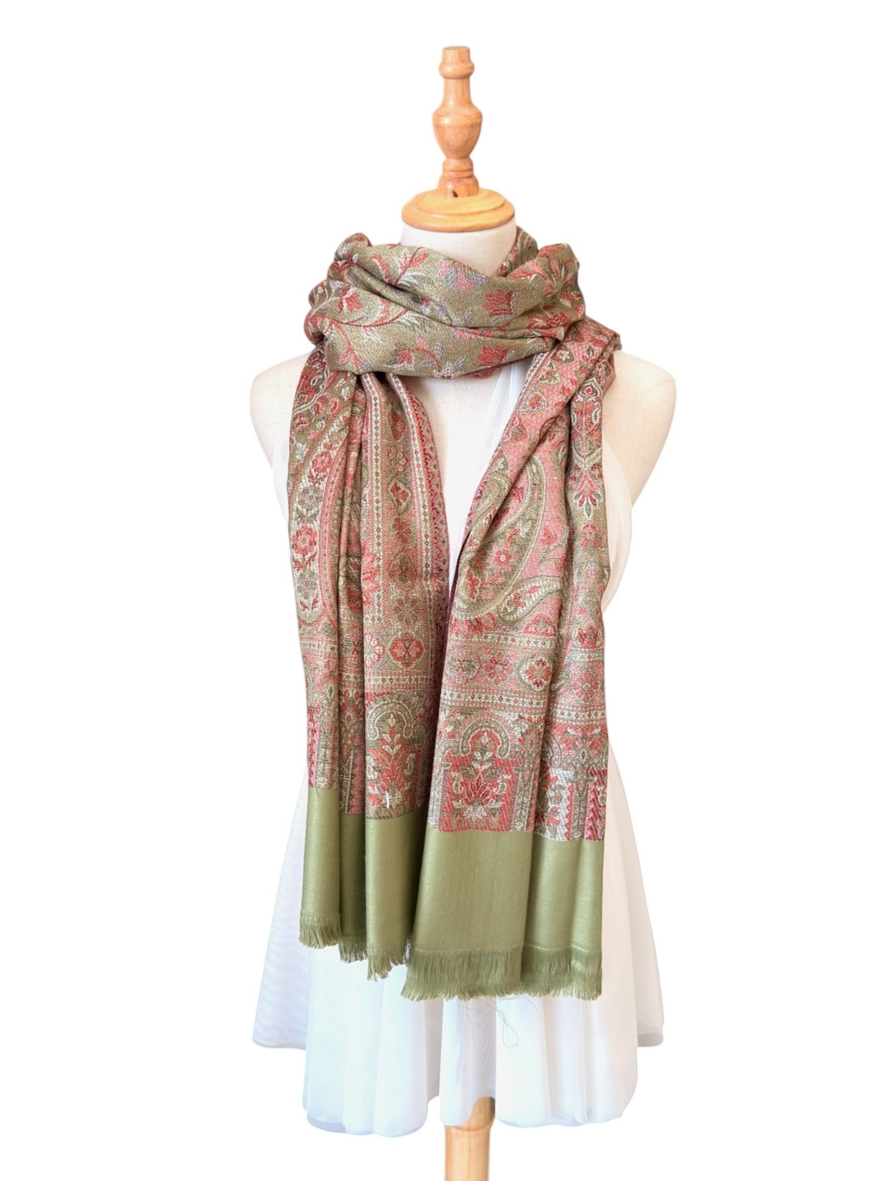 Noori Couture pashmina shawl in sage green and rose paisley print, crafted from a soft cotton and wool blend with fringe.