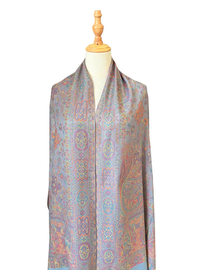 Noori Couture sea weed grey pashmina shawl with intricate paisley pattern in coral, gold, and violet on a mannequin.