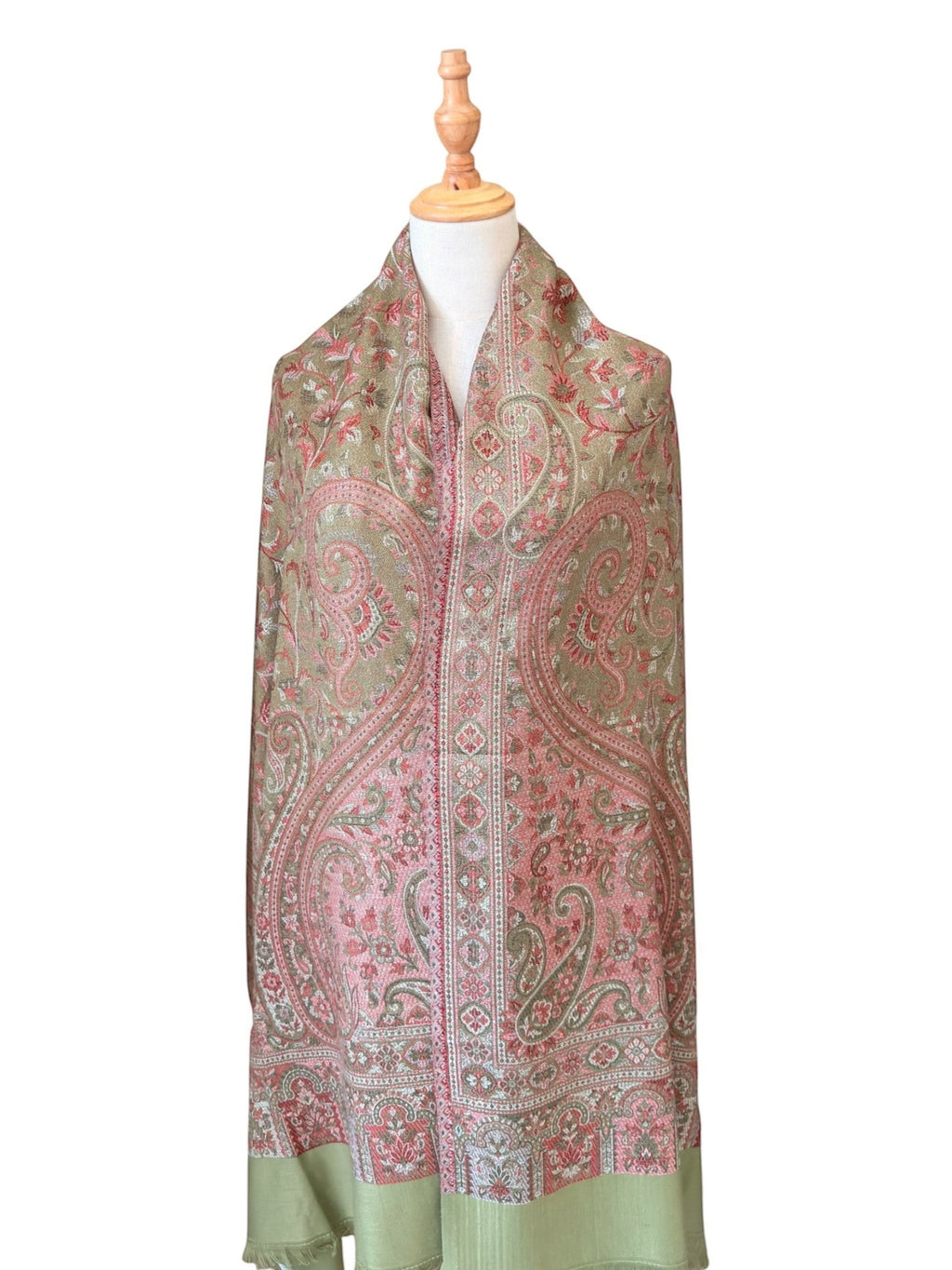 Noori Couture pashmina shawl in sage green and rose with intricate woven paisley patterns and delicate fringe edges.