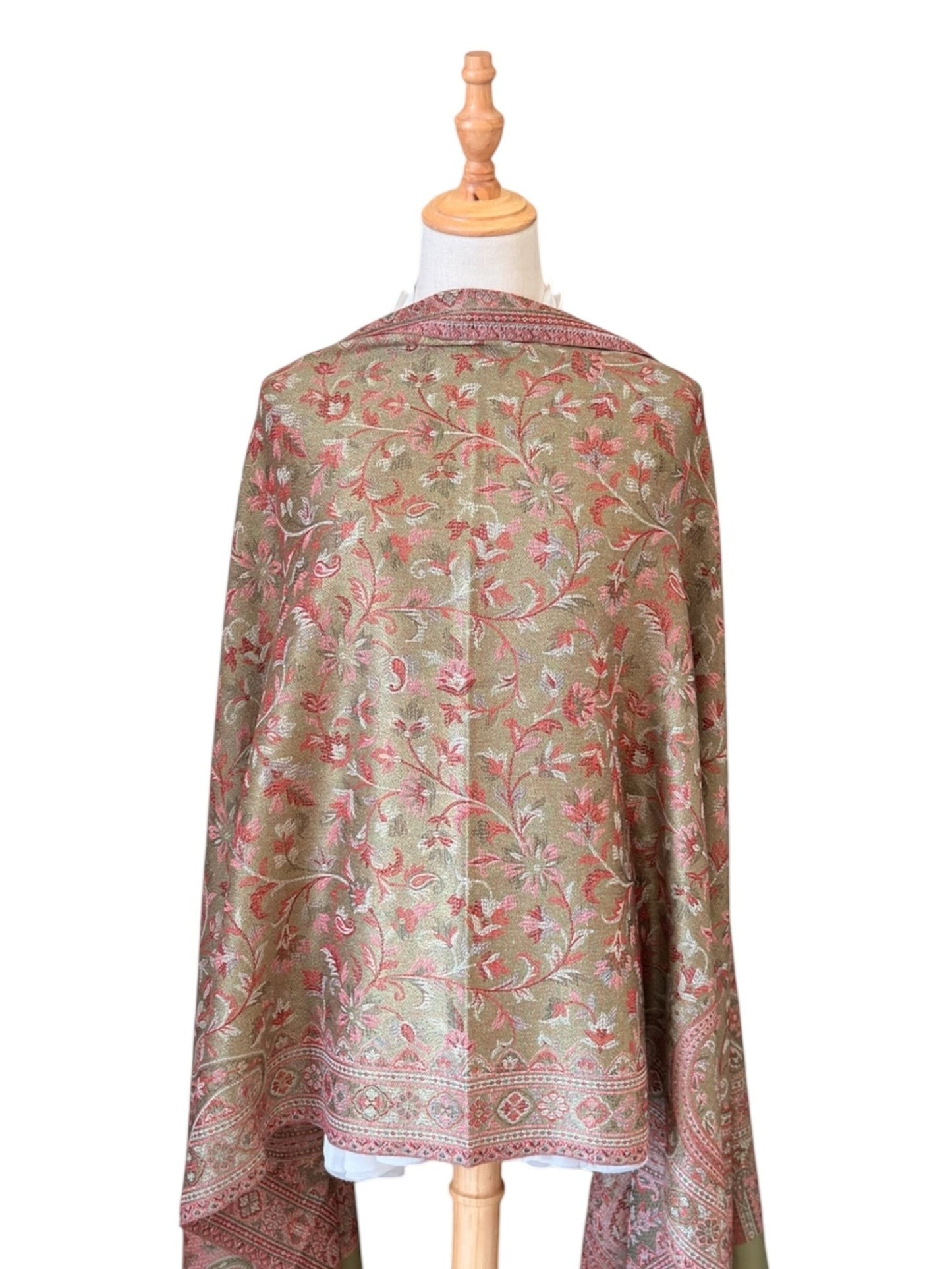 Noori Couture pashmina shawl in sage green and rose paisley print with fringe, crafted from a cotton and wool blend.