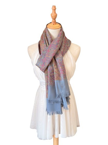 Noori Couture sea weed grey pashmina shawl featuring an intricate paisley pattern with coral and gold accents and fringe.