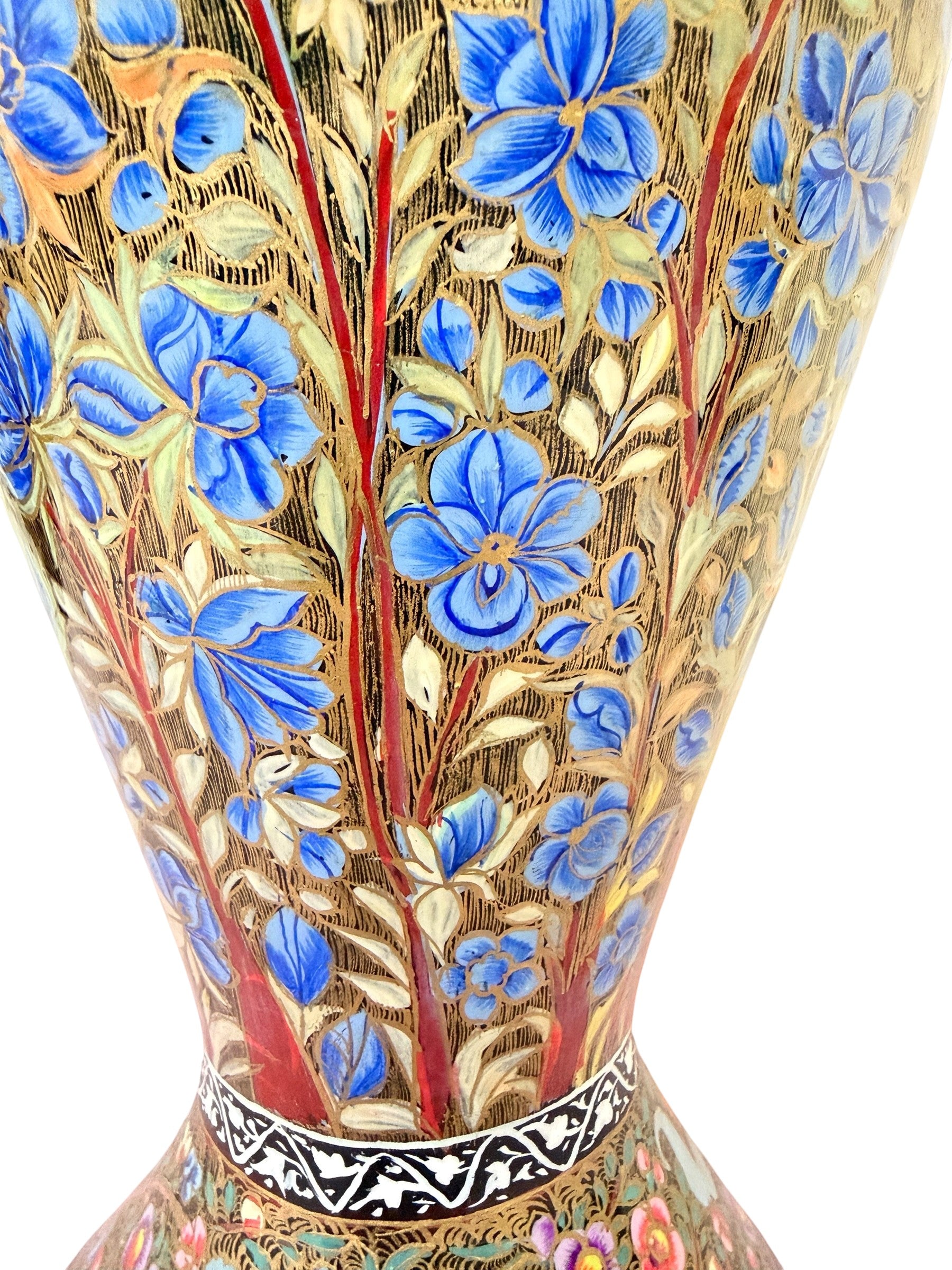 Noori Couture hand-painted paper mâché vase with blue floral and red stem design on a gold textured background.