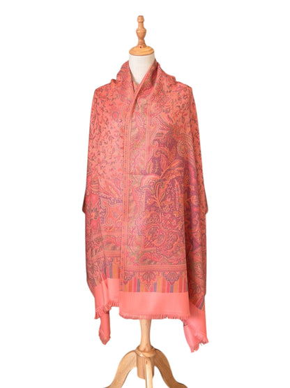 Noori Couture pastel pink pashmina shawl with intricate paisley pattern and delicate fringe on a mannequin
