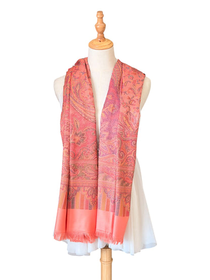 Noori Couture pastel pink pashmina shawl with intricate paisley patterns and delicate fringe on a mannequin