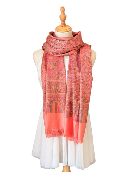 Noori Couture pastel pink pashmina shawl with intricate paisley patterns and delicate fringe on a mannequin
