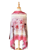 Noori Couture red and white 100% Merino boil wool shawl with intricate hand-embroidered floral patterns.