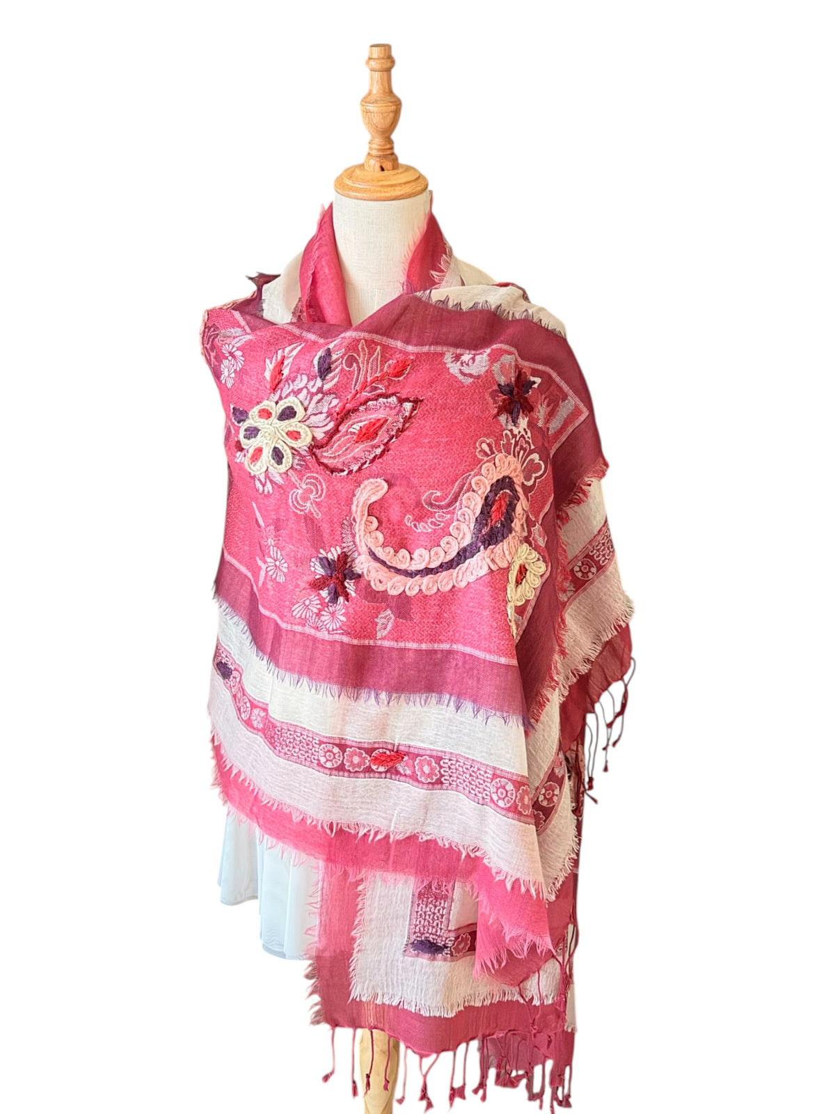 Noori Couture red merino wool shawl featuring intricate hand-embroidered floral and paisley patterns with fringe trim.