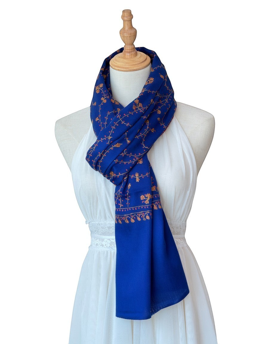 Noori Couture royal blue handwoven shawl with intricate gold floral embroidery and jali detailing.