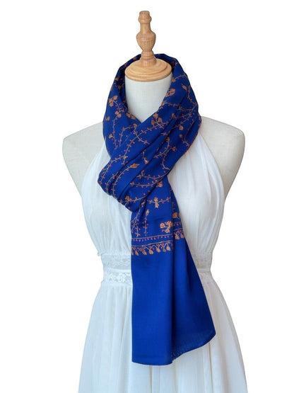 Noori Couture royal blue handwoven shawl with intricate gold floral embroidery and jali detailing.