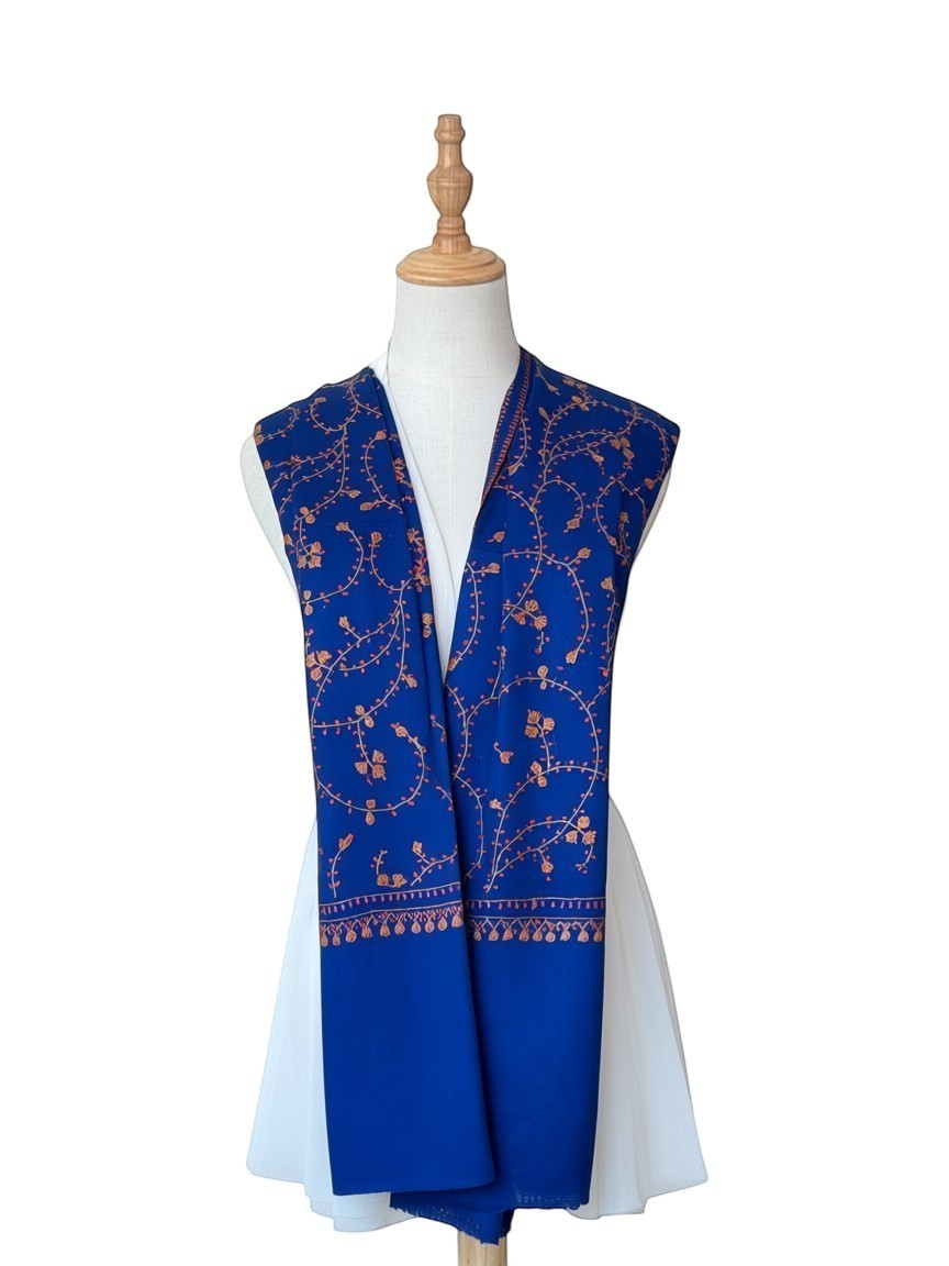 Noori Couture royal blue handwoven shawl with intricate Sozni Jali embroidery and delicate border detail.