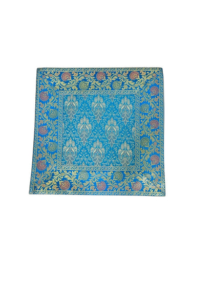 Noori Couture Royal Cushion Cover in blue jacquard with damask pattern and gold cord trim. Traditional floral accents.