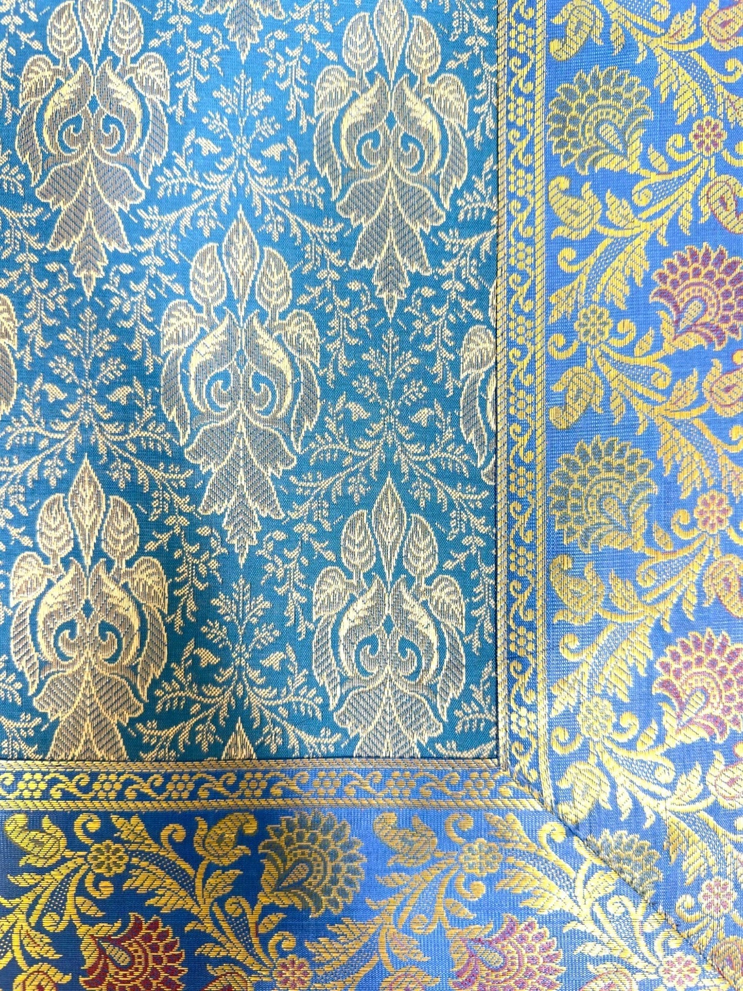 Noori Couture Royal Cushion Cover in blue jacquard fabric with damask pattern and gold cord trim.