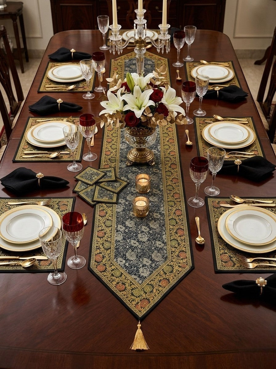 Noori Couture Royal Dining Set: 13-piece luxury table runner, placemats, and coasters with gold tassels and floral pattern.