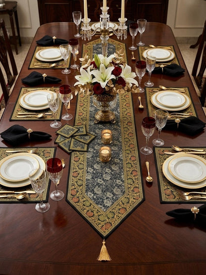 Noori Couture Royal Dining Set: 13-piece luxury table runner, placemats, and coasters with gold tassels and floral pattern.