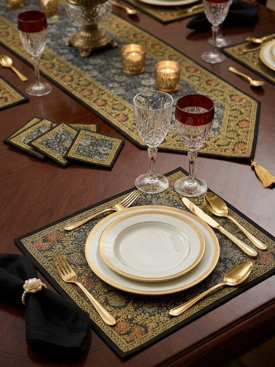 Noori Couture Royal Dining Set: 13-piece table runner, placemats, and coasters with ornate gold floral patterns on a deep blue background.