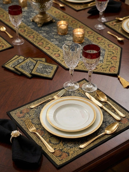 Noori Couture Royal Dining Set: 13-piece table runner, placemats, and coasters with ornate gold floral patterns on a deep blue background.