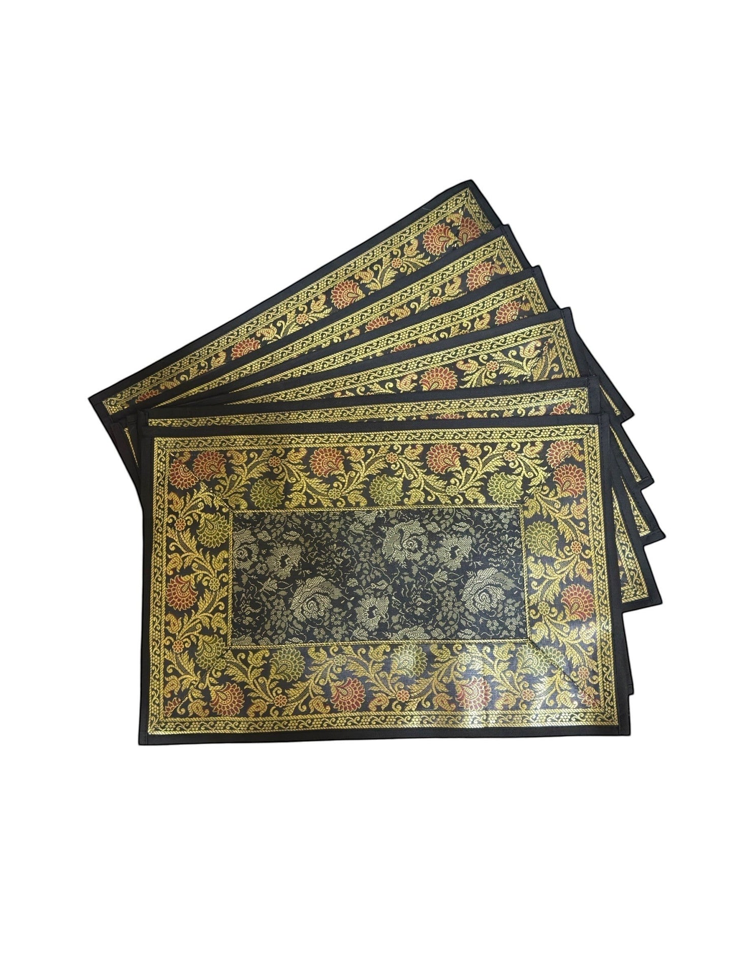 Noori Couture Royal Dining Set placemats with ornate gold floral pattern on black fabric.