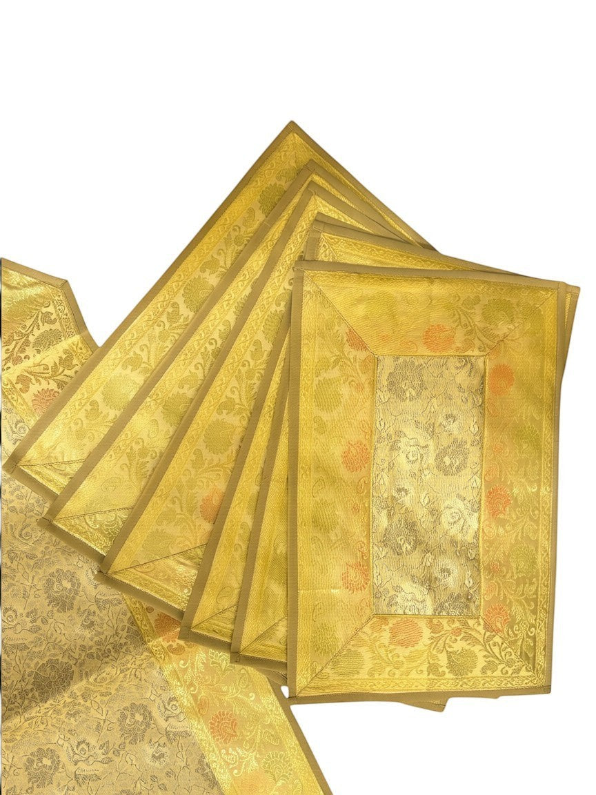 Noori Couture 13-piece Royal Zari dining set with table runner, placemats, and coasters in gold Banarasi art silk with paisley Tanchoi weaving.