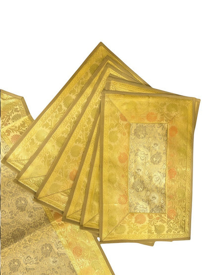 Noori Couture 13-piece Royal Zari dining set with table runner, placemats, and coasters in gold Banarasi art silk with paisley Tanchoi weaving.