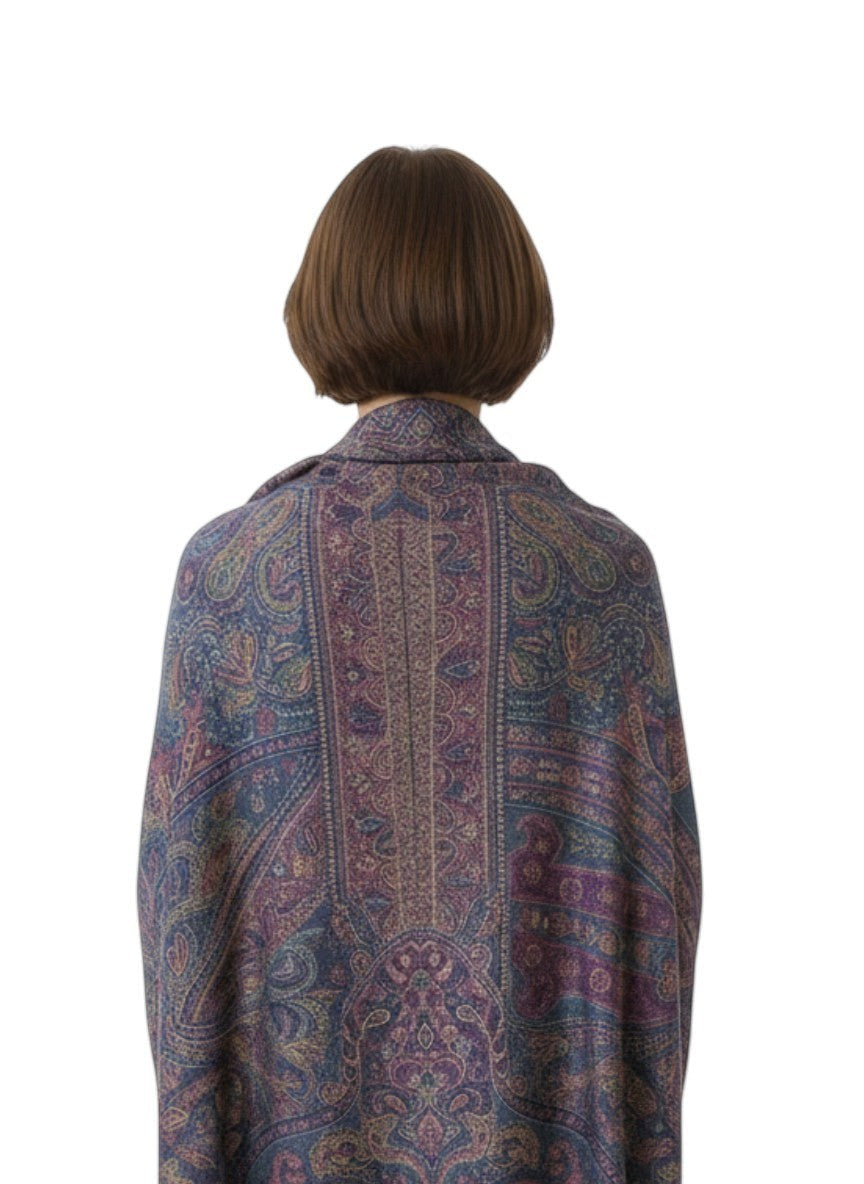 Noori Couture handwoven pure silk shawl in deep blue and purple with intricate paisley patterns. Features a central vertical motif and a soft, luminous finish.
