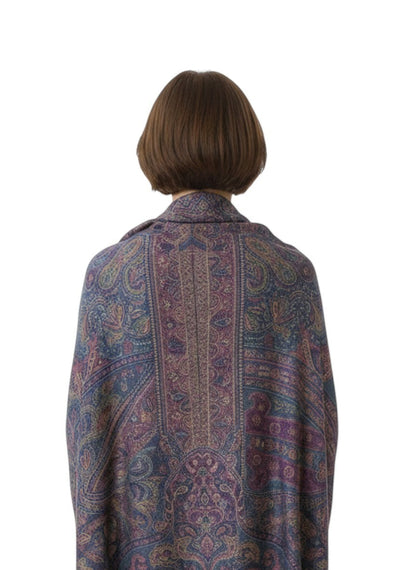 Noori Couture handwoven pure silk shawl in deep blue and purple with intricate paisley patterns. Features a central vertical motif and a soft, luminous finish.