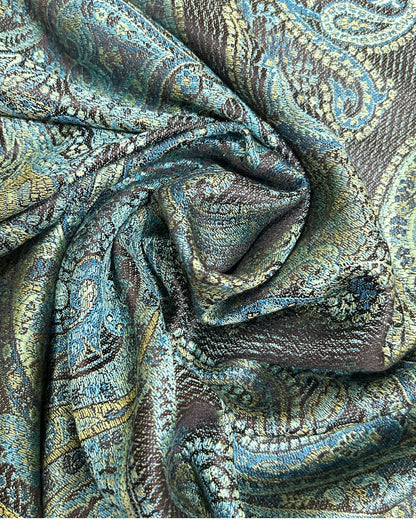 Noori Couture handwoven pure silk shawl in teal and black with a paisley pattern. Luxurious, soft, and breathable.