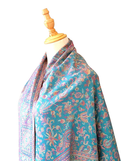 Noori Couture pashmina shawl in teal and violet with intricate paisley and geometric patterns and fringed hem