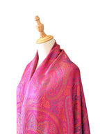 Noori Couture handwoven violet pink mulberry silk shawl featuring an intricate paisley pattern on a mannequin