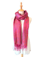 Noori Couture handwoven violet pink mulberry silk shawl with intricate paisley patterns and delicate fringe detail.